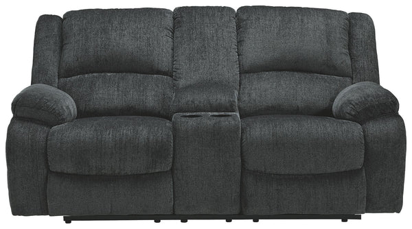 Built for luxury, this reclining loveseat with center console lets you kick back in reliable style. The thick, softly textured chenille upholstery provides a comfy surface on which to lounge. With bustle back construction and thickly cushioned armrests, t