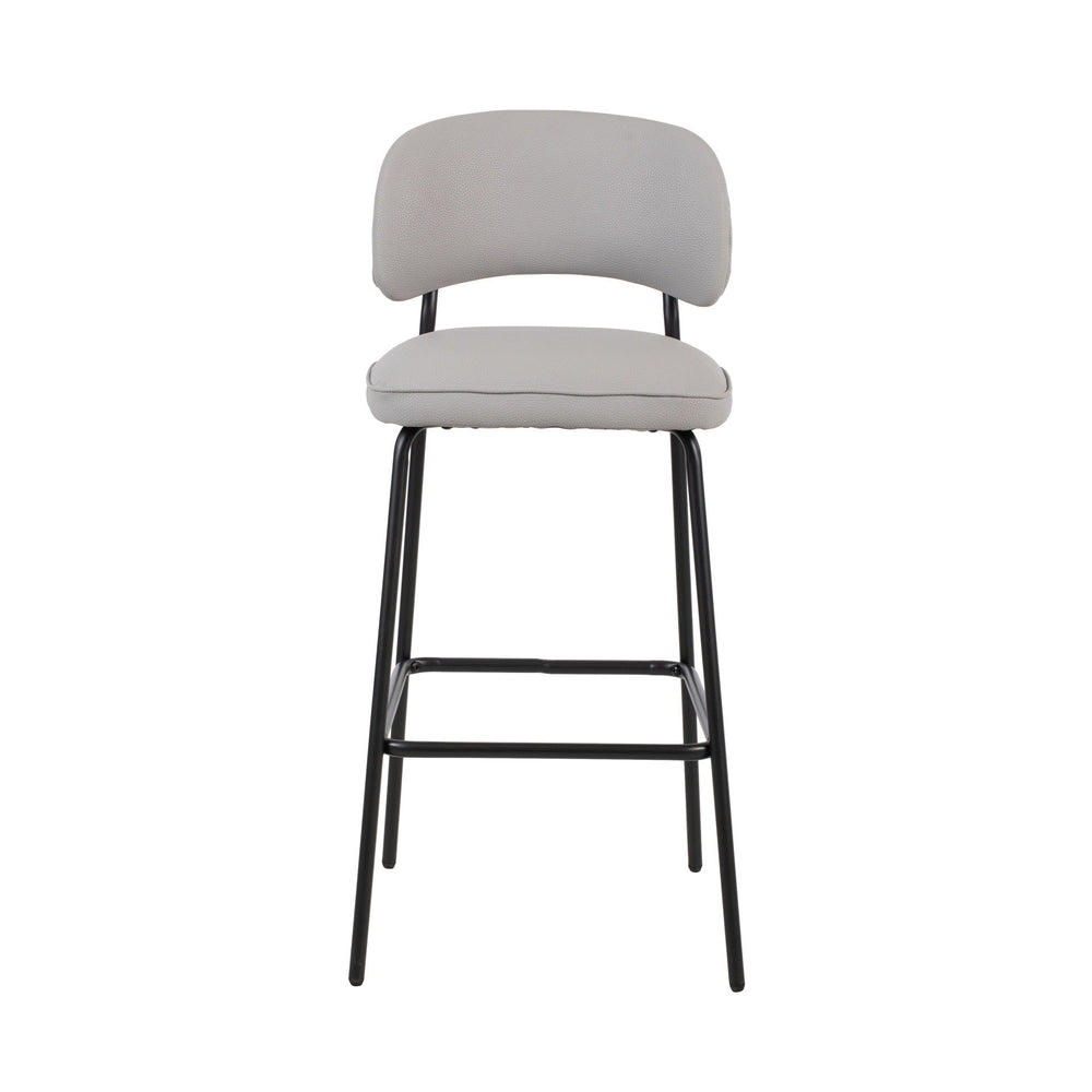 The Blythe Ivory Faux Leather Bar Chair set delivers a perfect blend of style and function, making it an excellent choice for any modern space. Each set includes two bar chairs with a sleek, arched back and low profile that brings a contemporary touch to 