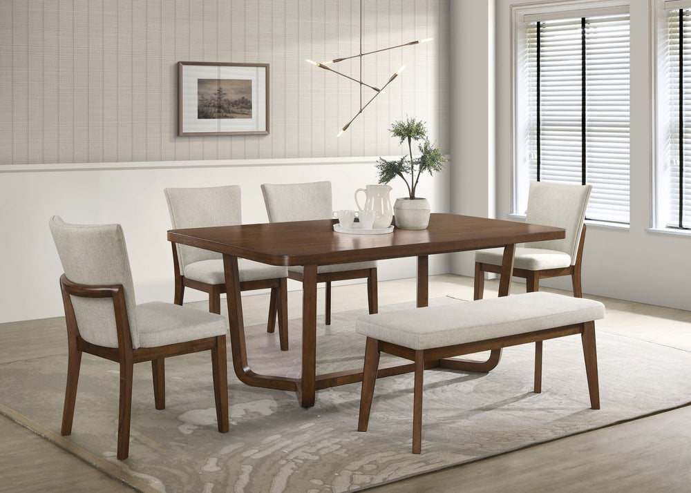Elevate your dining space with this sleek and sophisticated dining set, designed to seamlessly blend modern elegance with mid-century inspiration. The beautifully crafted table features a warm wood finish and a unique sculptural base, adding a refined tou