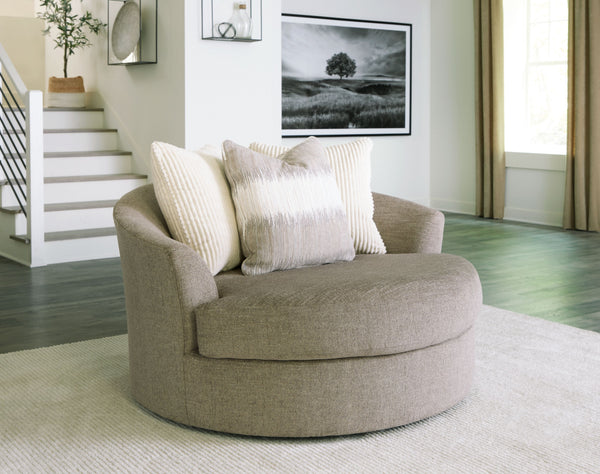  this oversized swivel accent chair rounds out your seating options with ease. Its generous scale cradles you in comfort