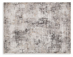 This area rugâ€™s abstract design provides a perfectly imperfect spin on contemporary style. Its plush pile delivers a wonderfully unique tapestry of tone and visual texture. Whether your style is classic or contemporary, the simply chic aesthetic goes wi