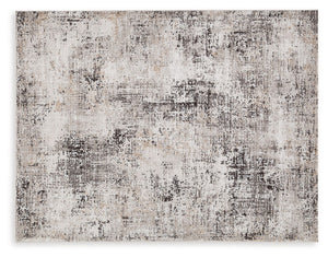 This area rugâ€™s abstract design provides a perfectly imperfect spin on contemporary style. Its plush pile delivers a wonderfully unique tapestry of tone and visual texture. Whether your style is classic or contemporary, the simply chic aesthetic goes wi