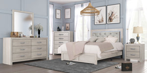  bringing a warm and inviting ambiance to any modern living space. The sleek lines and sparkling metal handles of the s
