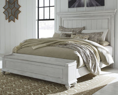 Give your retreat vintage charm with this queen panel bed and storage footboard. In a beautifully distressed whitewash finish, you-'ll love the headboard-'s grand style featuring a picture framed panel. The bench footboard is equally elegant offering extr
