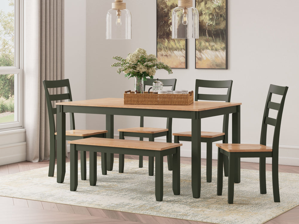Complement your homeâ€™s simply relaxed sensibility with this dining table, chairs and bench. A charming green hue offers a chic contrast to the natural wood tone, for a casual look that vibes with a variety of aesthetics. Whether you-'re sipping your mor