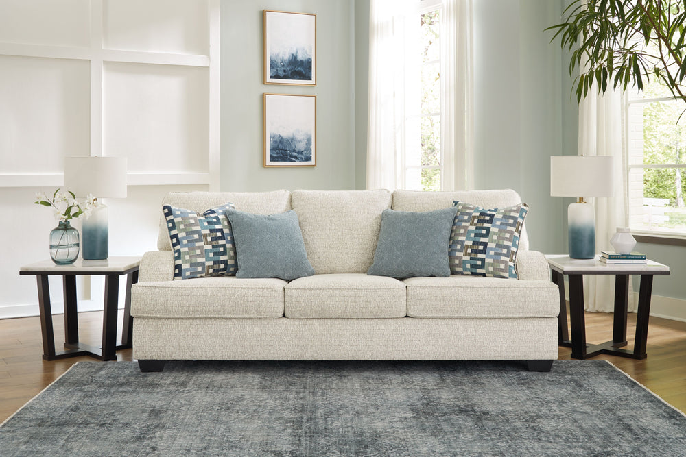 This sofa has the corner on casual contemporary style and everyday comfort. Chic and subtly innovative, its crosshatched chenille upholstery is a forward-thinking take on fashionable neutrals. The sleek frame gets a soft, streamlined touch with sloping tr