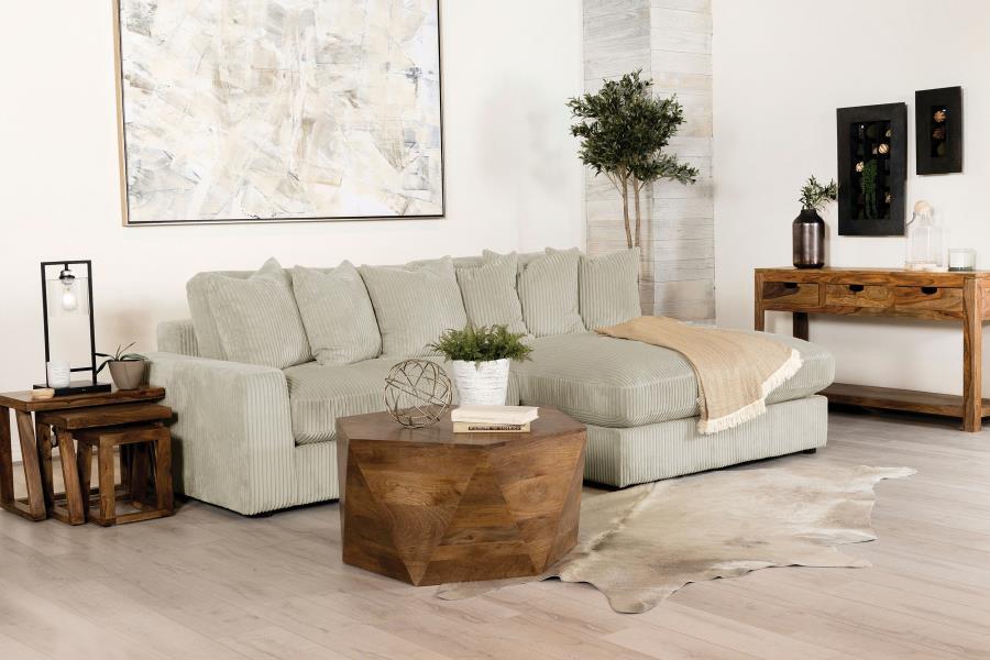 Bring retro-inspired elegance to your contemporary seating environment with this modern reversible sofa and oversized chaise. Upholstered in vintage-like wide corduroy fabric, it offers a soft texture in elegant fog or sand tones. The two-piece design fea