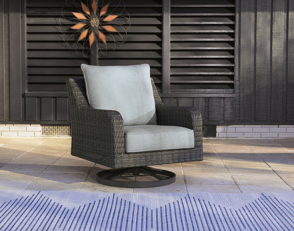 Add a distinguished touch of gray to your outdoor living space with this swivel lounge chair. It-'s made with resin wicker over an aluminum frame for a relaxed look that provides seasons of enjoyment. Rest assured, the thick seat and back cushions are wra