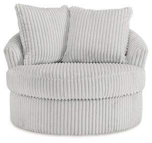  while throw pillows elevate the cozy factor. A smooth-gliding 360-degree swivel lets you go with the flow. Come on