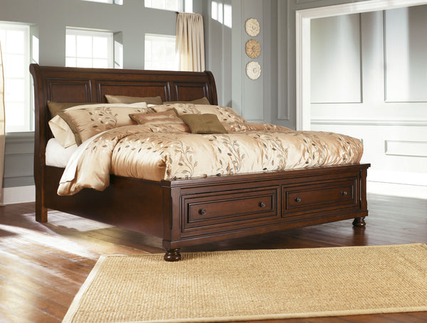 Those drawn to the warm, rustic feel of vintage-inspired interiors love how this California king sleigh storage bed suits their style. Rustic finish is rich with character, while beveled panel framing and turned bun feet reflect beauty in the details. Two