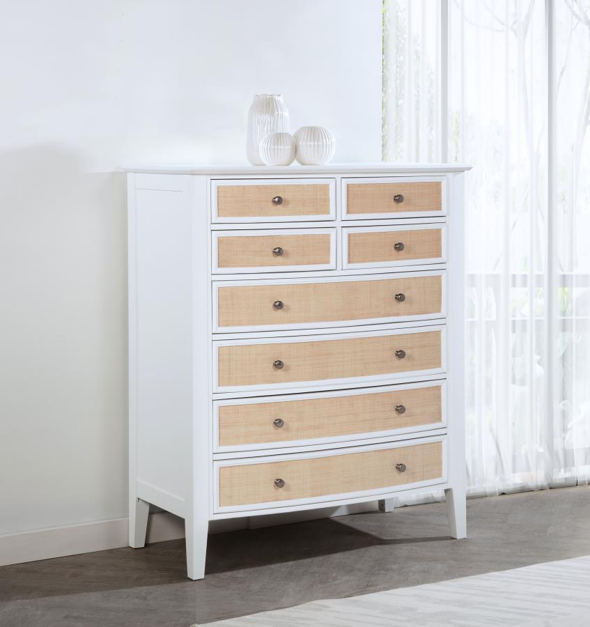 Create ample storage in your stylish bedroom with a modern eight-drawer chest. Its coastal style is established with a cool white finish paired with natural rattan finish accents on its drawer fronts, offering compelling contrast and texture. Eight drawer