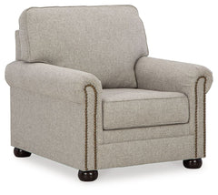 Inspired by the past but rooted firmly in the present, this chair complements your transitional seating area. Its versatile upholstery is delightfully detailed for a subtle herringbone effect. Designer touches like decorative nailhead trim and bun legs ad