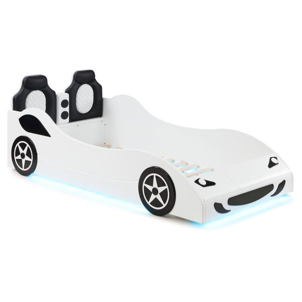 Modern race car aesthetics inform the design of a novelty car bed perfect for kids. Its twin size is versatile, allowing for plenty of space to play within the bedroom. The car is complete with realistic details and features LED strip lighting underneath,