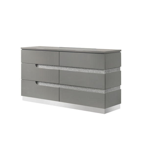 The Paradox Six Drawer Dresser in Gray combines contemporary appeal with robust functionality. Its gleaming Gray gloss laminate finish offers a sleek, modern look while providing the practical benefits of scratch and water resistance. Crafted from a combi