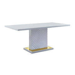 The sleek clean-lined table Gaines dining table offers subtle a hint of glam, the base offers a touch of gold to enhance the textured vertical lined pedestal. The gray high gloss finish reflects light and makes any dining space appear larger and grander. 