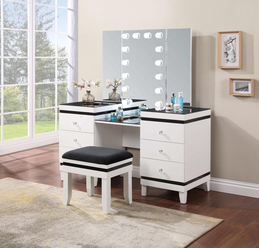 Take modern glam to new heights with the bold contrast and sophistication of this contemporary vanity desk. With six roomy drawers for easy storage, including a felt-lined top drawer for delicates, the large desk features a bold black and white finish sur