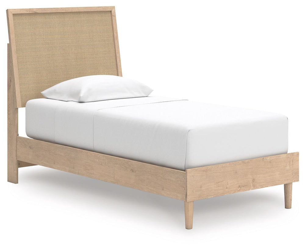 Clean-lined and contemporaryâ€”but far from starkâ€”this twin panel bed is a fresh style awakening. Pairing a light finish with replicated oak grain and textured beige details that replicate the look of cane, its mixed materials bring a naturally versatil