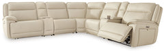 This power reclining sectional with consoles is the perfect combination of sleek style and thoughtful functionality. Engineered for comfort and convenience, it offers concealed storage compartments and endless relaxation. From movie nights to family gathe