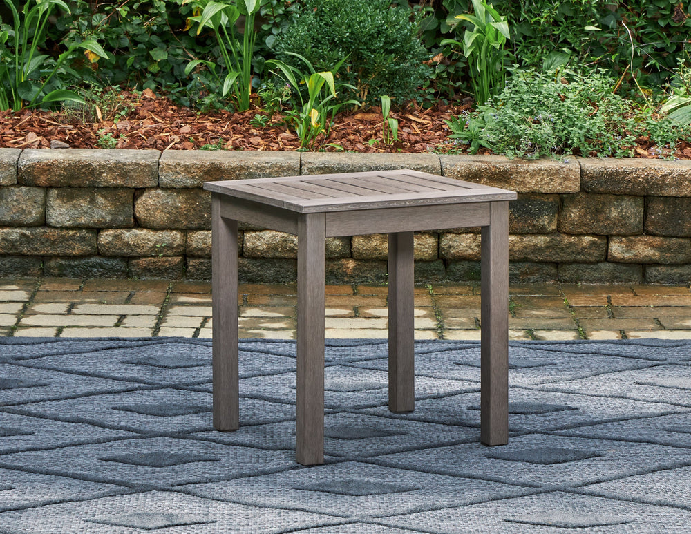 This end table is a stylish outdoor piece with staying power. Built for longevity with Weatherwood, a synthetic material with the appearance of wood, it indulges you in contemporary design without sacrificing durability. Stunning form and canâ€™t-miss fun