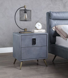 The Doris Nightstand by Acme Furniture features two drawers, splayed legs, a keyed security system, three electric outlets, two USB ports, and a grey finish.