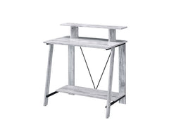 Expore your inspiration and creativity in a warm, soothing vibe that the Nypho Desk brings to your office. Filled with cozy tone and natural textures. the desktop is all crafted from wood in a homey and rustic finish. Designed with a stylish -"V-" shape, 