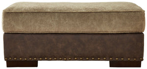  contemporary style of this ottoman is perfect for those who love the look of leather. Two textural tones provide twice the style and comfortâ€”and incorporate an added layer of visual interest.<br><b