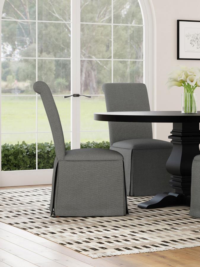 Put a stylish, somewhat formal spin on your dining room decor with a set of two classic parson chairs. Each features a tall back with an armless profile for impeccable comfort and elegance. The chair features plush foam padding, complete with neutral upho