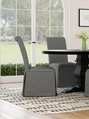  somewhat formal spin on your dining room decor with a set of two classic parson chairs. Each features a tall back with an armless profile for impeccable comfort and elegance. The chair features plush foam padding