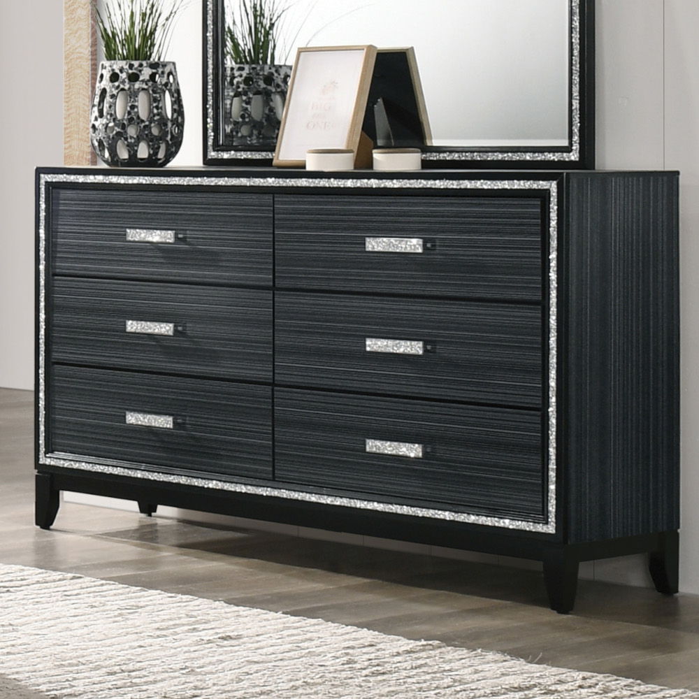 Classic design with touches of modern aspects makes this Haiden Dresser ideal for any bedroom. The piece offers a rectangular tabletop and six storage drawers for displaying or organizing. It also features a glamorous shimmering silver accent trim that ad