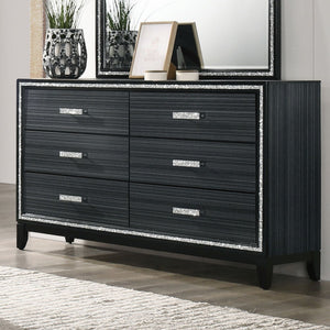 Classic design with touches of modern aspects makes this Haiden Dresser ideal for any bedroom. The piece offers a rectangular tabletop and six storage drawers for displaying or organizing. It also features a glamorous shimmering silver accent trim that ad
