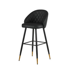 The Oliver Black Vegan Leather Bar Chair set combines contemporary style with practical features to enhance any modern space. Each set includes two bar chairs with a sleek, arched back and low profile, offering a chic yet refined aesthetic. Crafted from e