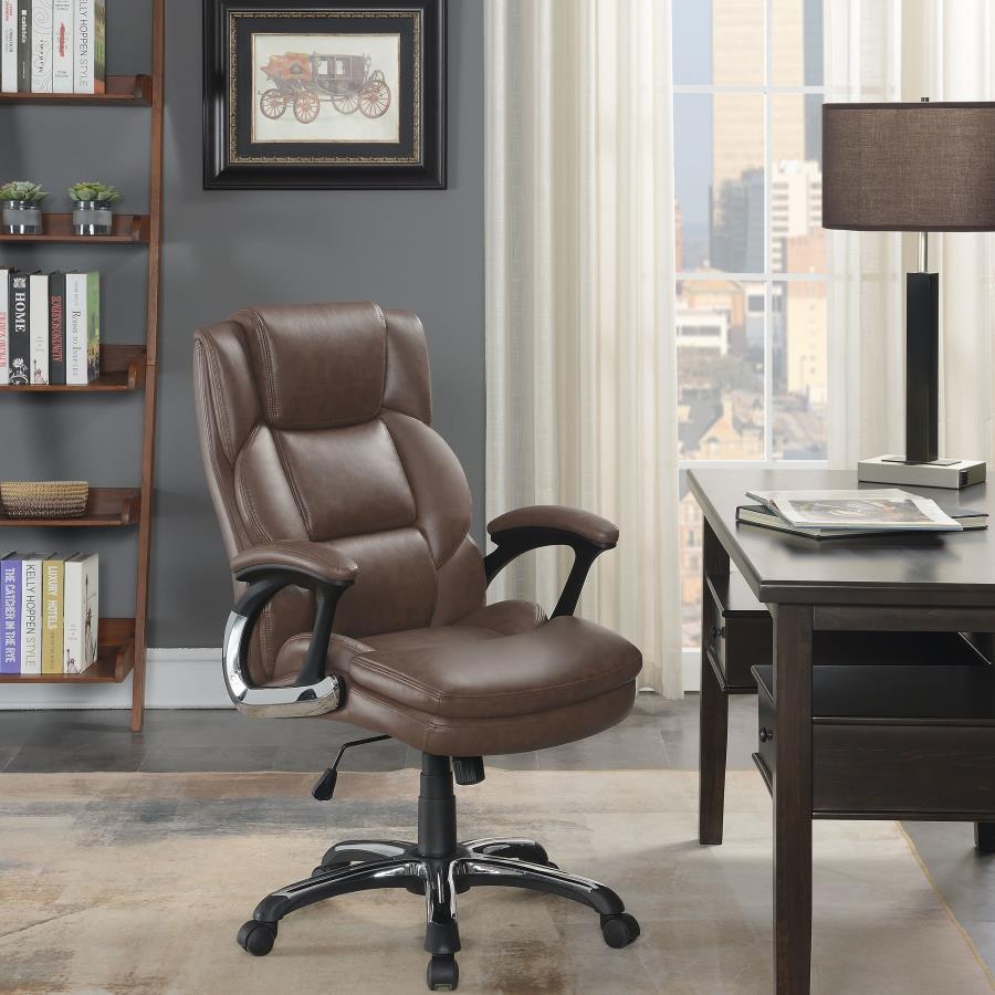 Perfect for a home office, this office chair features plush seating and headrest for working long hours. Wrapped in a supple leatherette, this chair also offers ergonomic design with curved, padded armrests. Get around the office easily with five chrome c