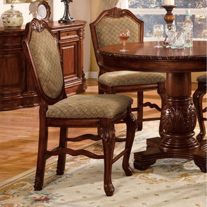 The Chateau De Ville counter height chairs are great for kitchen counters or living room bar tables. This pair of chairs come supported by a fine hardwood frame with two queen anne front legs and two straight back legs. The backrest arches to a peak with 