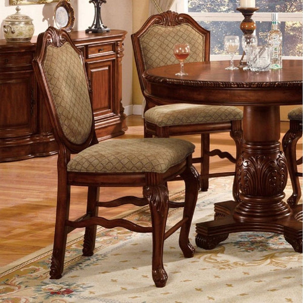 The Chateau De Ville counter height chairs are great for kitchen counters or living room bar tables. This pair of chairs come supported by a fine hardwood frame with two queen anne front legs and two straight back legs. The backrest arches to a peak with 