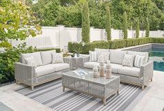 This set is a beautiful addition to any outdoor living space. Resin wicker on an aluminum frame. Wood look paint finish. Nuvella premium high performance fabric. Tempered glass top tables. Stainless steel hardware. <h4><b>Seton Creek - Gray - Sofa with Cu