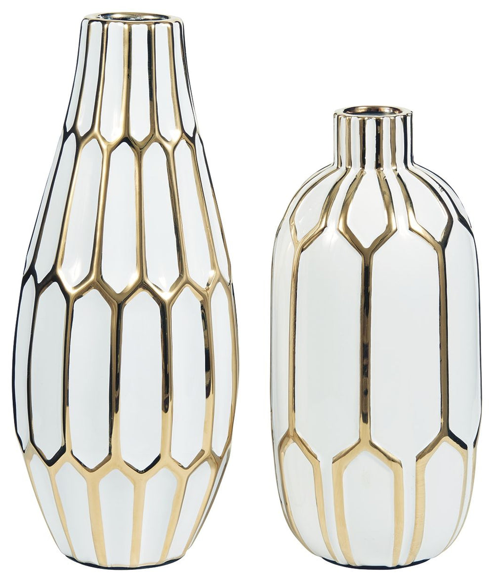 Stunning in goldtone and white, this 2-piece vase set is what your homeâ€™s been missing. Varying sizes in the honeycomb-inspired geometric pattern bring visual appeal. These vases arenâ€™t just good for looks, theyâ€™re durable enough to go outside, too.