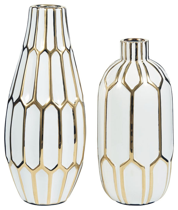 Stunning in goldtone and white, this 2-piece vase set is what your homeâ€™s been missing. Varying sizes in the honeycomb-inspired geometric pattern bring visual appeal. These vases arenâ€™t just good for looks, theyâ€™re durable enough to go outside, too.