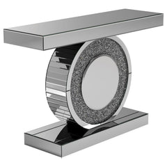 Add dazzling flair to your entryway or living room with this glamorous console table. Featuring a mirrored surface and a bold geometric design, it showcases a sculptural circular base encrusted with glittering silver crystals. The sleek rectangular top an