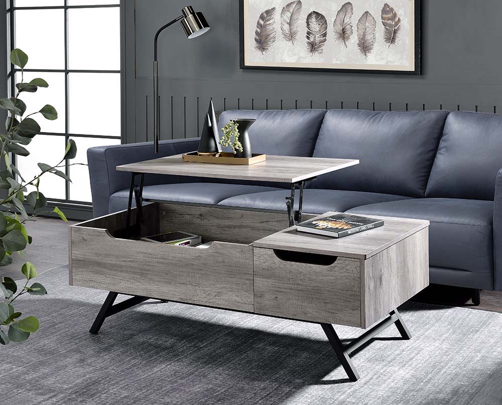 Never leave your couch again. Give your home a distinguished new look with this Throm lift-top coffee table in a gray oak finish. This coffee table offers a spacious surface that conveniently lifts for the ideal multipurpose workspace for you to work from
