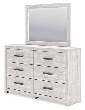  this dresser with mirror embraces the aesthetics of countryside living and repurposes them for modern settings. Its whitewash paint