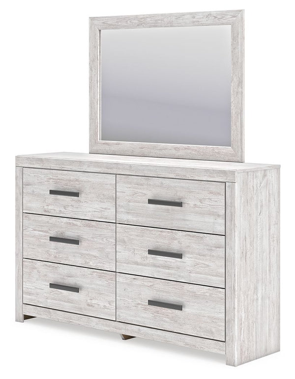  this dresser with mirror embraces the aesthetics of countryside living and repurposes them for modern settings. Its whitewash paint