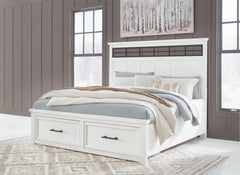 This queen panel storage bed delivers casual style with substance. An inset metal detail on the headboard displays a unique take on modern farmhouse design. The bed-'s sturdy silhouette, classic white finish and black pulls exude a comfortably cozy vibe i