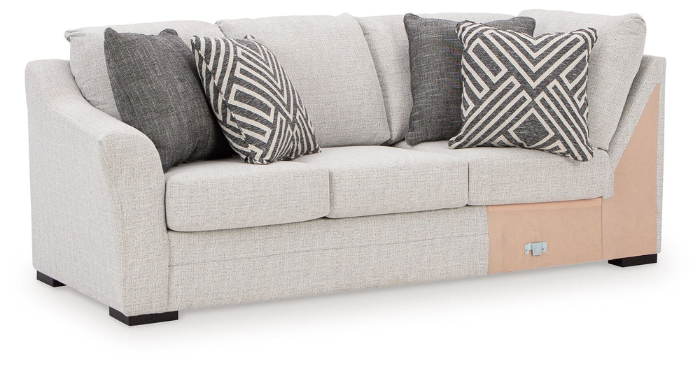 This left-arm facing sofa with corner wedge is made with Next-Gen Nuvellaâ„¢ (solution-dyed polyester) high-performance fabric. Pairs with other items in the series to make a sectional.<br><br><b>Additional Dimensions</b><br><ul><li>Arm height: 27-"</li><