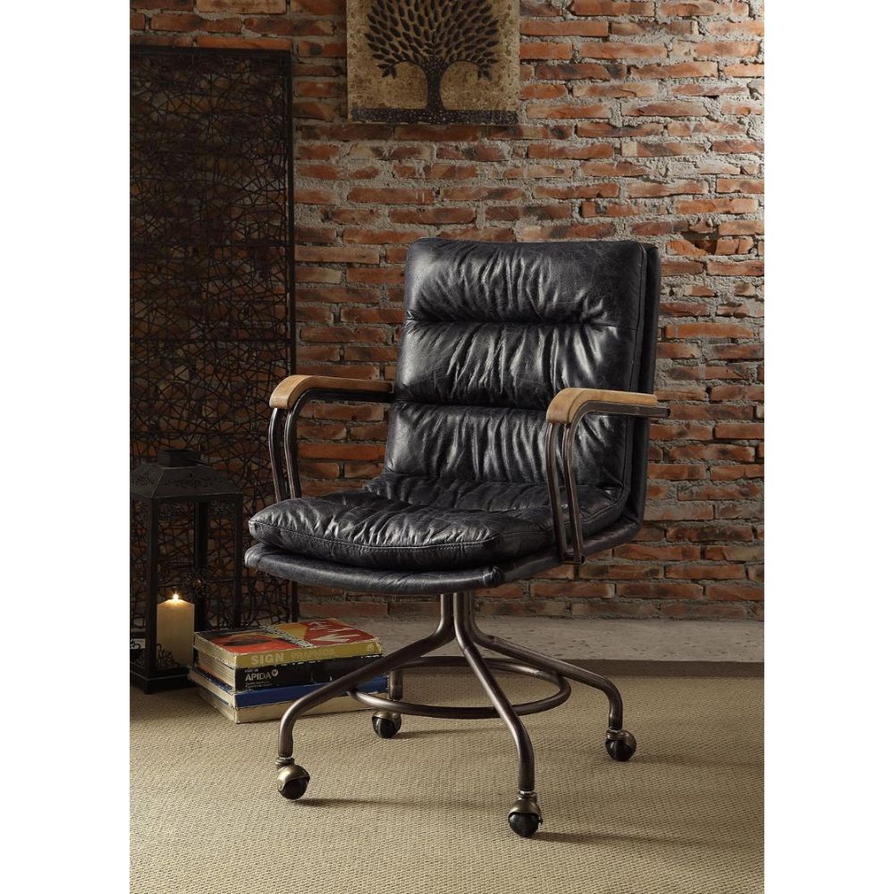 The Harith office chair brings comfort and style to any work space. Handsome, channel-seamed vintage top grain leather upholstery is complemented by a metal base with casters and metal frame armrests. It-'s Industrial design promise comfort and function a