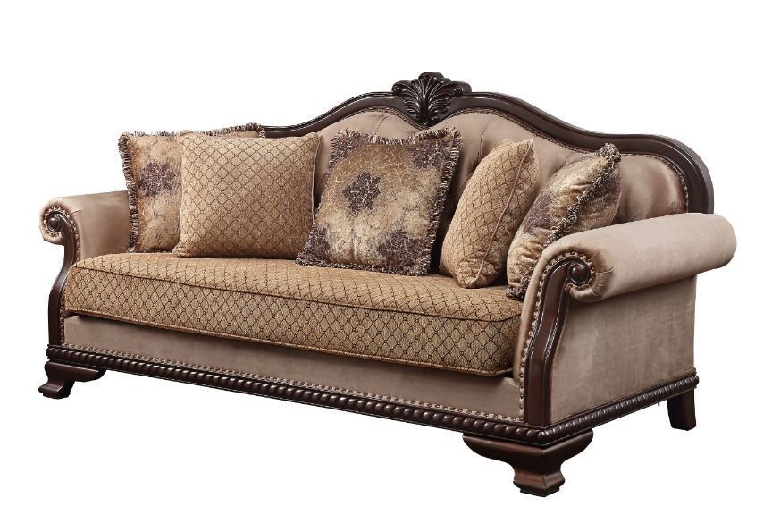 The Chateau De Ville sofa set surrounds you in a warm and cozy embrace. Wood carved details with nail-head accent embody a timeless look with an old world flair. Floral decorative pillows and upholstered cushions with tufted details soften the whole const