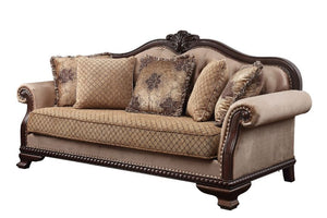 The Chateau De Ville sofa set surrounds you in a warm and cozy embrace. Wood carved details with nail-head accent embody a timeless look with an old world flair. Floral decorative pillows and upholstered cushions with tufted details soften the whole const