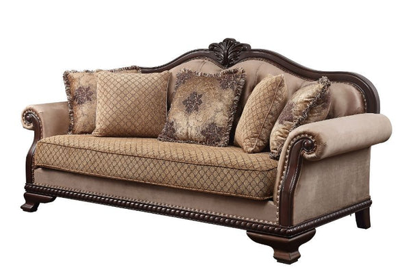 The Chateau De Ville sofa set surrounds you in a warm and cozy embrace. Wood carved details with nail-head accent embody a timeless look with an old world flair. Floral decorative pillows and upholstered cushions with tufted details soften the whole const