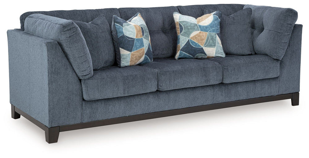 Fresh, on-trend style meets functionality in this sofa. Details like tufted cushions and a wrap-around accent base reflect your urban contemporary tastes while staying versatile as your style changes. And with its soft upholstery, your comfort is kept a p