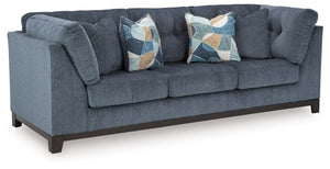  on-trend style meets functionality in this sofa. Details like tufted cushions and a wrap-around accent base reflect your urban contemporary tastes while staying versatile as your style changes. And with its soft upholstery