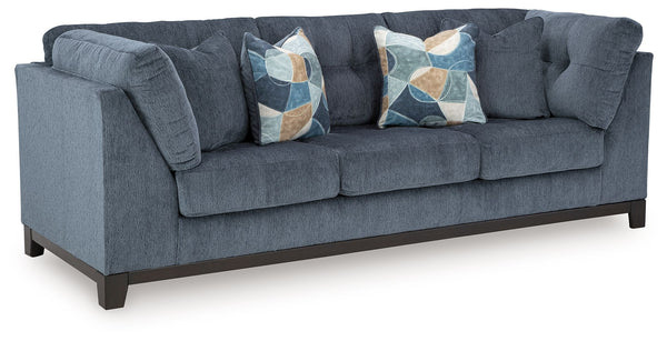  on-trend style meets functionality in this sofa. Details like tufted cushions and a wrap-around accent base reflect your urban contemporary tastes while staying versatile as your style changes. And with its soft upholstery